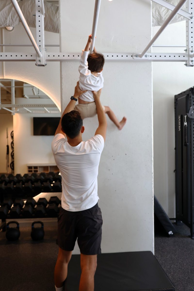Tony with his son at the Club Crux studio